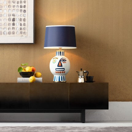Lampe en porcelaine avec abat-jour motif visage abstrait